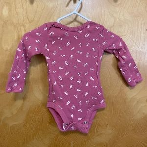 Carters pink floral onesie with reversible sleeve.